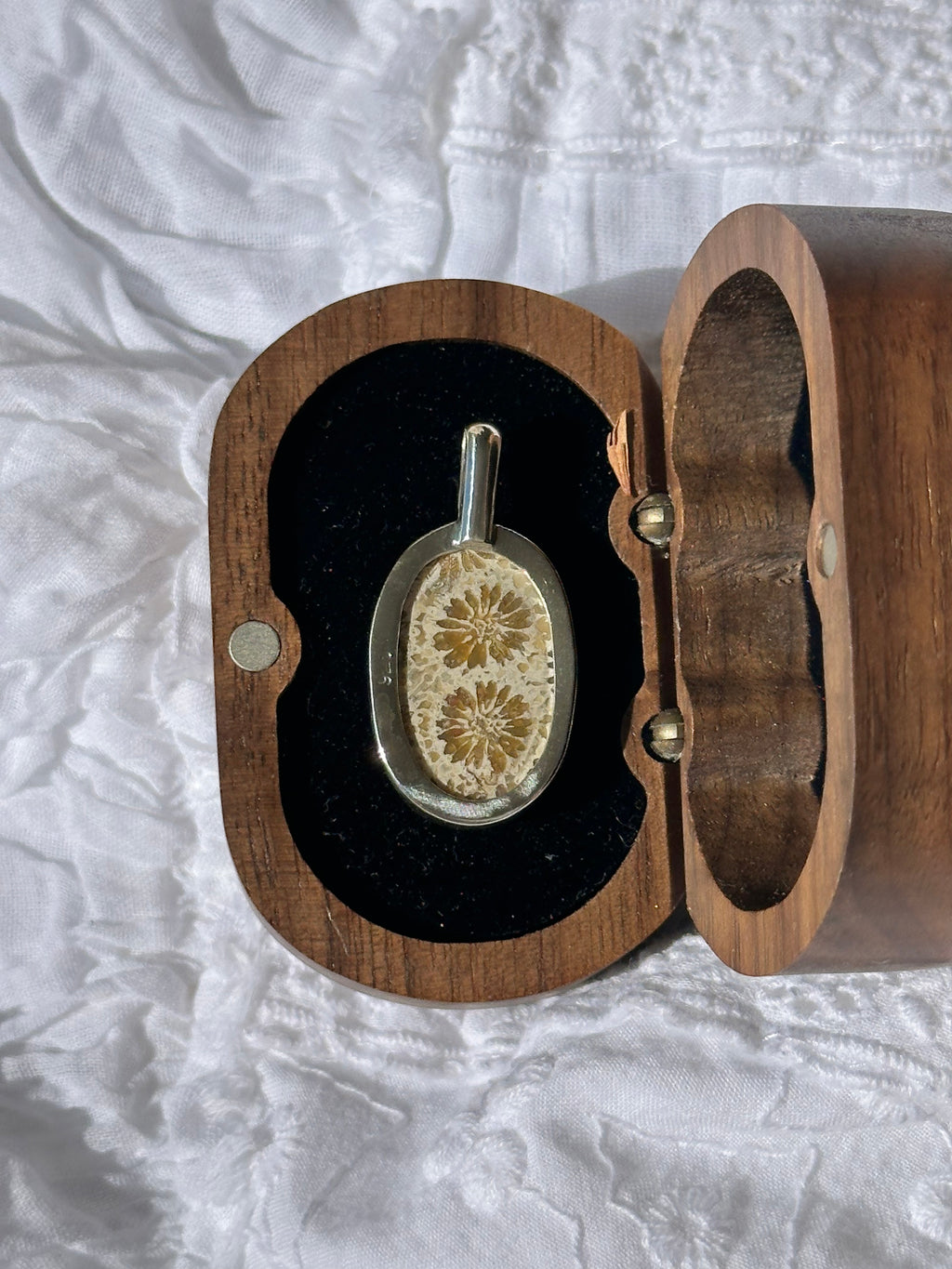 Fossilised coral pendant 1